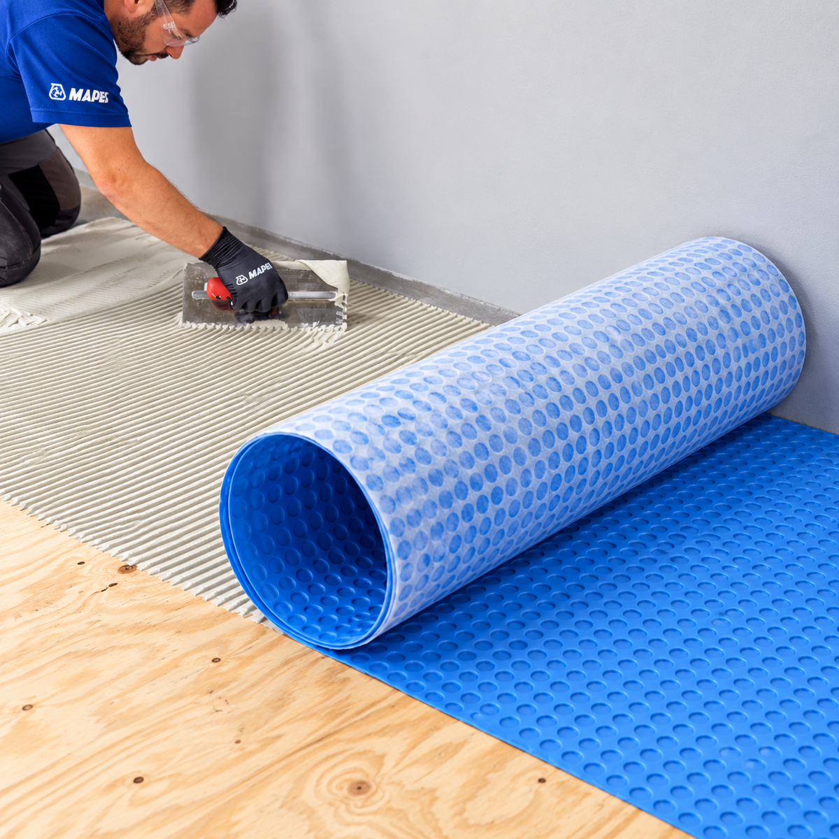 Mapei MAPEGUARD UM 35 decoupling matting installation over timber subfloor