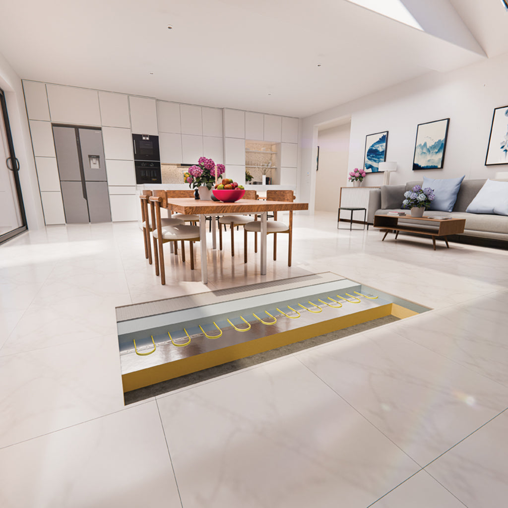 A modern open-plan living and dining space with light-colored flooring, a wooden dining table and chairs, a sofa, and built-in kitchen cabinetry in the background. There is a cutout in the floor showing the Thermosphere underfloor heating screed cable inbedded in screed on top of xps insulation board.
