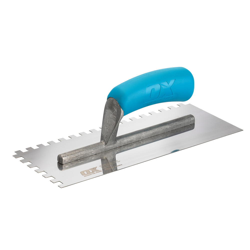 OX Trade notched stainless steel trowel for spreading tile adhesive on walls and floors — trade-quality with comfortable handle