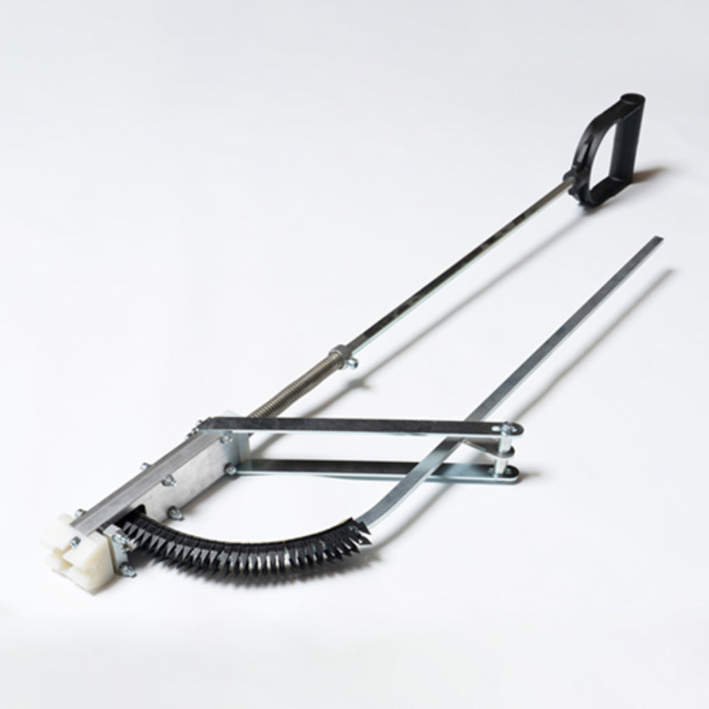 A metal ThermoSphere Screed Cable Staple Gun tool with a long handle, black plastic grip, curved metal body, black spring, and white plastic end cap, photographed on a light gray studio background.