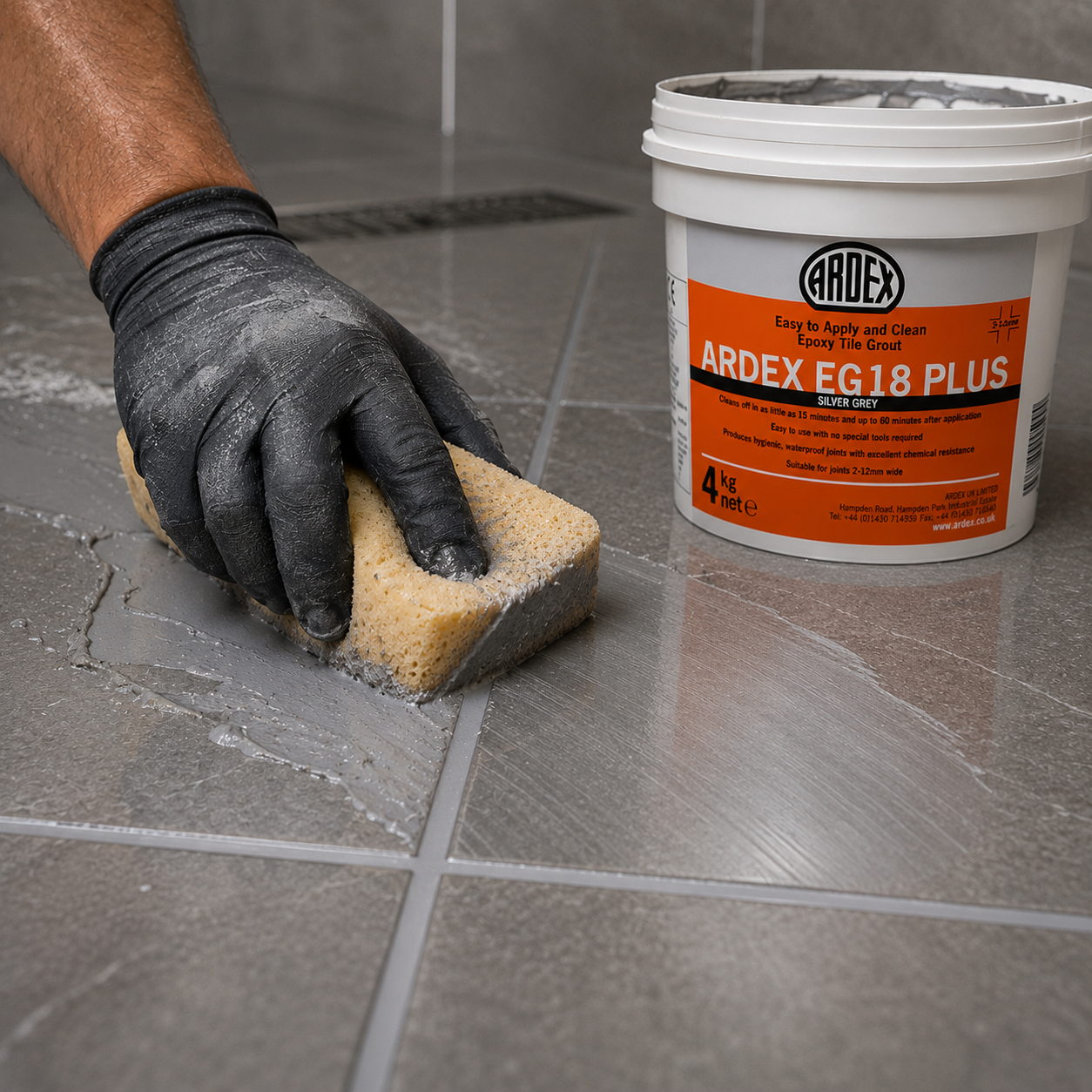 Ardex EG 18 Plus epoxy tile grout being applied up close with a grout float