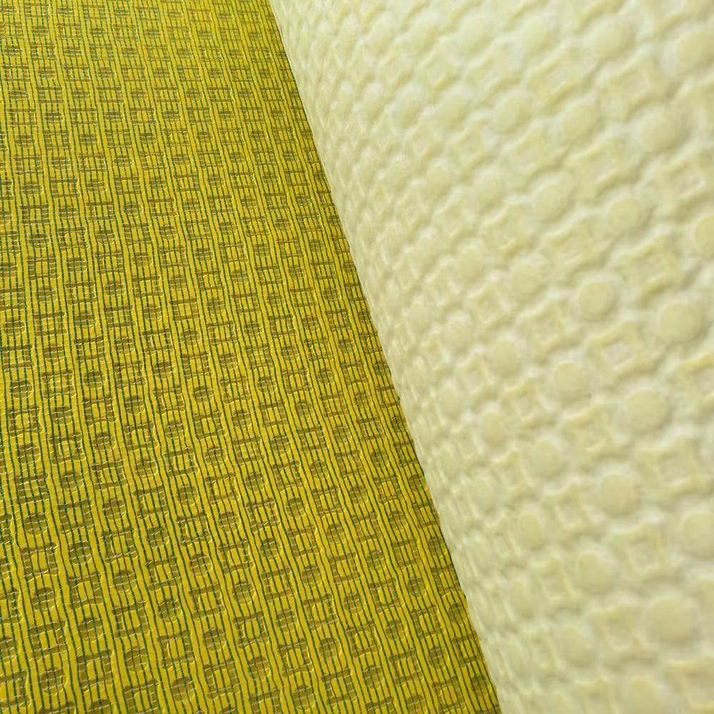DuraElite Max Decoupling Matting mesh-reinforced backing detail — high tensile strength for a strong bond with flexible tile adhesives